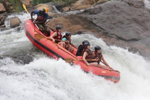 Taking the plunge down a 6-metre waterfall. Photo courtesy of Nile River Explorers.